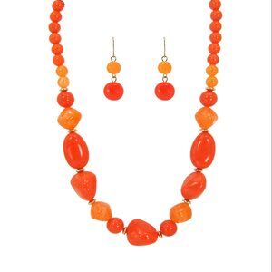 Orange bead necklace earring set with large chunky beads and gold accents
